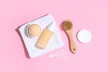 Composition with spa accessories on pink background