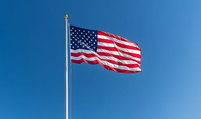 Obraz premium American flag. The USA flag blowing in the wind, symbolizing American pride and patriotism. 