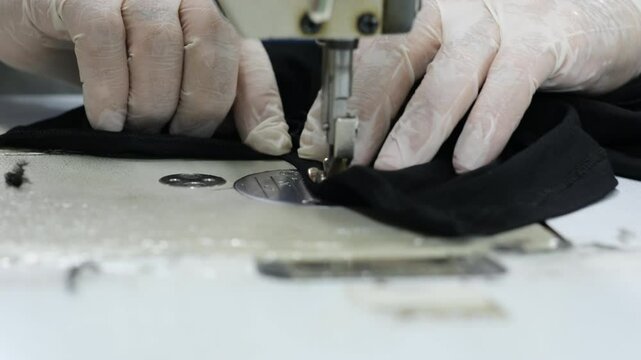 Efficient Fabric Handling and Sewing Process in a Modern Factory