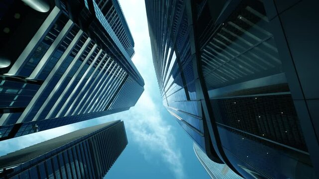 Modern business architecture with glass and steel walls reflecting sky clouds.