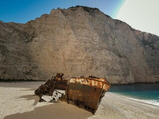 Navagio Beach shipwreck with towering cliffs in Zakynthos, Greece