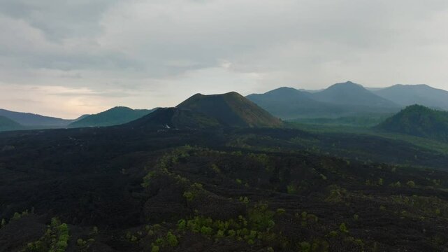 DRONE SHOT: DOLLY IN OF PARICUTIN VOLCANO AT SUNRISE