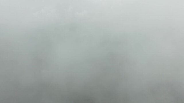 FAST DRONE SHOT OF PARICUTIN VOLCANO GOING INTO THE CLOUDS