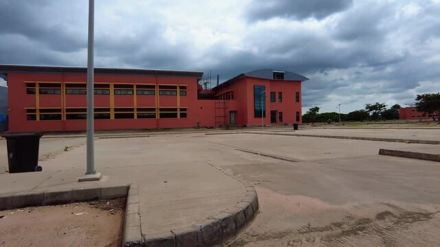 Touring UTG grounds and buildings School of Education on Faraba Banta Campus in Banjul, Gambia
