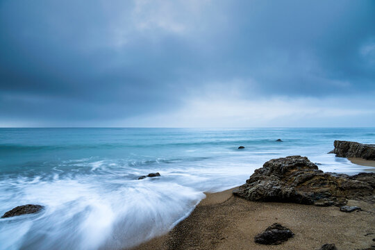 Sea stacks at the beach and dramatic sky, Aichi Prefecture, Japan