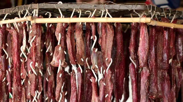 Venison steaks biltong cured and spiced, fan drying as it rotates on wheel