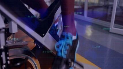 Cycling on exercise bike, fitness data processing animation over gym background - Powered by Adobe