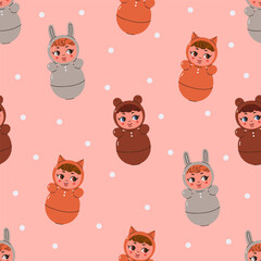 Seamless pattern with cute tumbler dolls. Vector graphics.