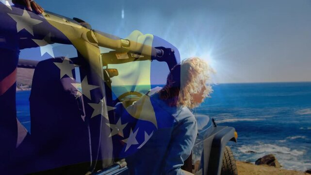 Bosnia and herzegovina flag animation over woman enjoying sunny day by ocean - Powered by Adobe