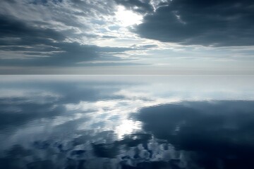 Obraz premium Calm Ocean Water Reflecting Cloudy Sky
