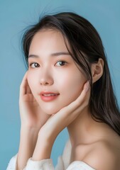 Fototapeta premium Portrait of a Young Asian Woman with Long Black Hair