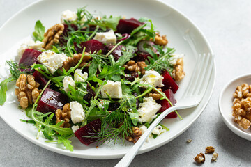 Fresh healthy beet, walnut and feta salad