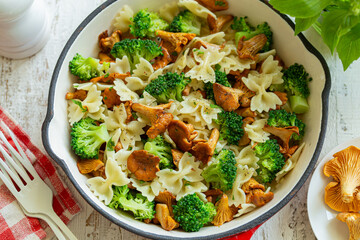 farfalle pasta with chanterelle mushrooms and  broccoli