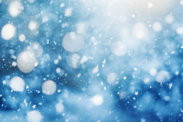 Obraz premium An enchanting winter scene featuring a blur of snowflakes against a deep blue background. The soft, swirling snow creates a sense of wonder and cold beauty.