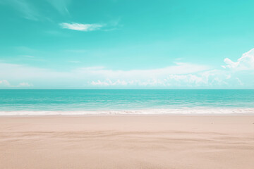 Fototapeta premium A serene tropical beach with a clear turquoise sea, soft sand, and a bright sky. The image provides a sense of calm and relaxation.