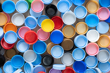 close up plastic bottles caps for recycling to conserve the environment, recycling, reuse, garbage disposal, save the world concpet