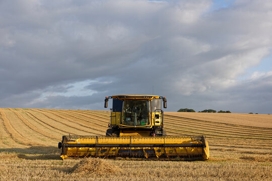 A New Holland CX8.85 Combine Harvester parked up in a harvested field of Barley close to the Village of Catterline in Aberdeenshire.