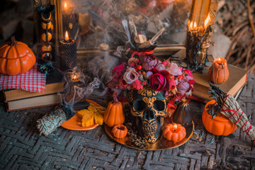 Candles scene with another design for Halloween party on a table, stuff for autumn Holidays
