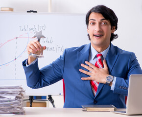 Busy businessman explaining business charts