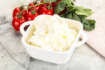 Soft cream cheese in the bowl