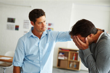 Men, comfort and crying in office with support, sad and listening for mental health at creative...