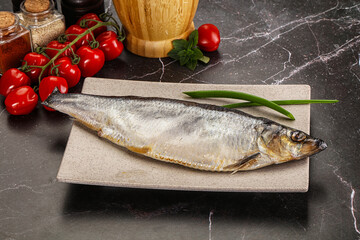 Whole raw salted herring fish