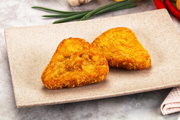 Fried potato hash brown snack