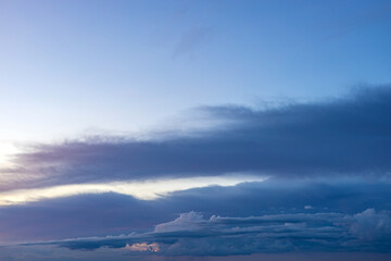  dark storm clouds against a clear sky. storm front. evening sky with dark clouds. 