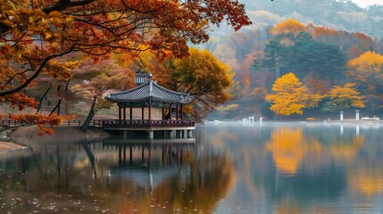 Fototapeta premium Autumnal Serenity: A Gazebo on a Misty Lake