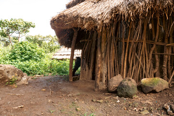 Scenic view of So Tepeth tribal village against the background of Mount Napak in Karamoja, Uganda
