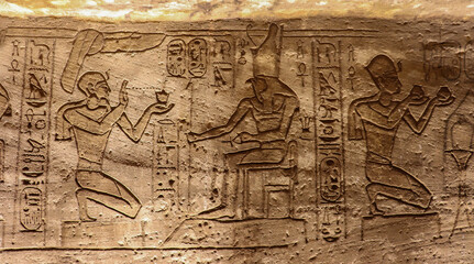 Ancient egyptian carvings and hieroglyphs at Abu Simbel temple