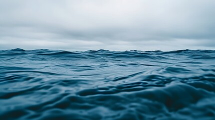 Macro shot of the rippling ocean surface under an overcast sky AI generated illustration