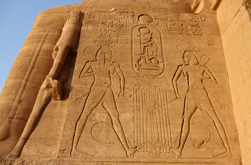 Ancient egyptian carvings and hieroglyphs at Abu Simbel temple