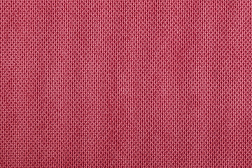 Red fabric cotton texture. Textile background fabric