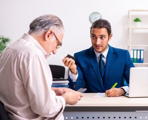 Financial advisor giving retirement advice to old man