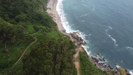 Fototapeta premium Drone shot of the cliffs near Gijon, Asturias, Spain