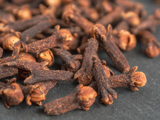 Fototapeta premium A close-up of aromatic cloves, highlighting the texture and rich color