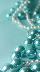 Background of round light turquoise Peebles and pearls