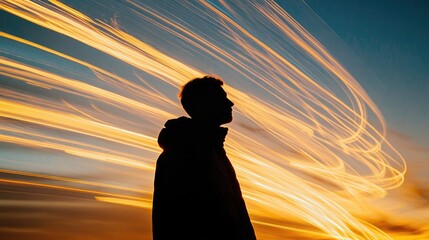 Transparent silhouette of a person facing rising light streaks, symbolizing momentum and upward movement from the horizon
