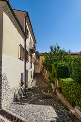 A street between old houses in Pietrabbondante, a village in Molise in Italy.