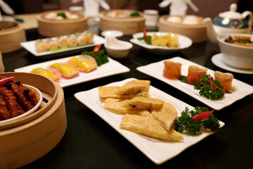 Close-up of delicacies on plates on table in the restaurant