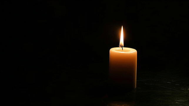 Burning candle on dark background, space for text. Memory day