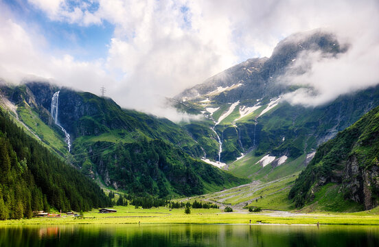Beautiful green lake in Mountain Alps landscape, Austria - natural landmark Hintersee in the Felber valley near Mittersill at the core zone of the national park High Tauern, Salzburg, Austria