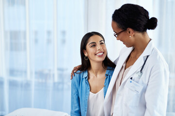 Smile, doctor and hug woman at hospital for consultation, discussion, support and medical advice of...