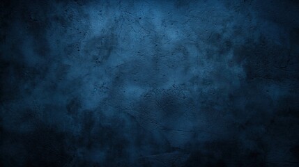 Fototapeta premium A dark blue concrete wall features a textured surface, softly illuminated, creating an atmospheric and moody ambiance perfect for artistic backgrounds