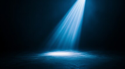 A single luminous object emerging from deep shadows