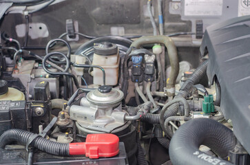 Close-up photos of engines, cars and various components.