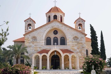 Fototapeta premium A church with a clock tower on the front