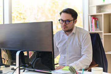 Company Director in a Modern Office, Focused on Work at Computer