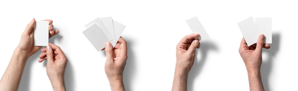 Two hands display blank cards in varying configurations, suggesting a brainstorming session or game preparation while set against a stark white backdrop